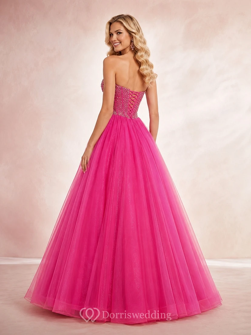 Vestido de fiesta/quinceañera de lujo en tul fucsia de un solo hombro, escote corazón y lentejuelas. view 2