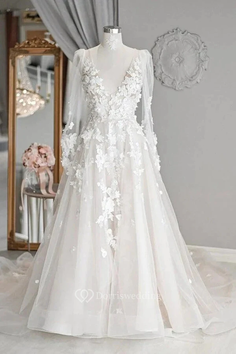 Vestido de novia de corte A con escote en V, mangas largas, efecto ilusión y apliques de encaje. view 3