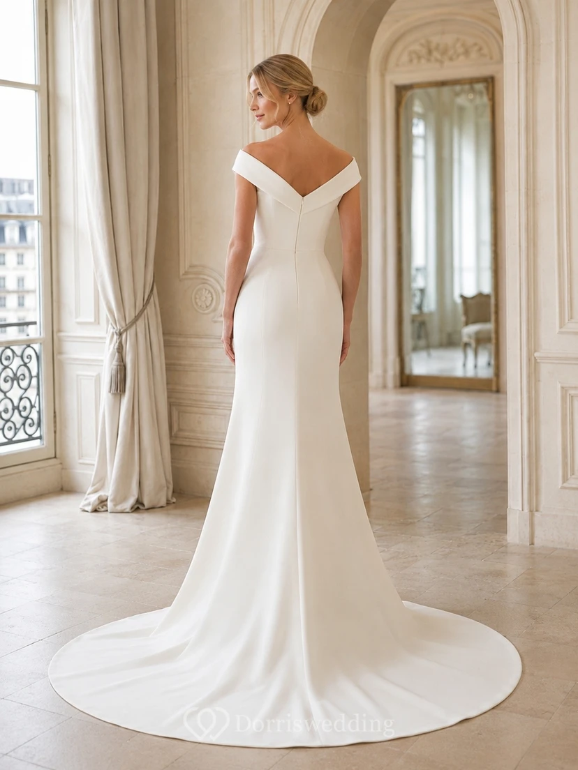 Vestido de novia minimalista sencillo estilo sirena con escote Bardot y cola larga. view 2