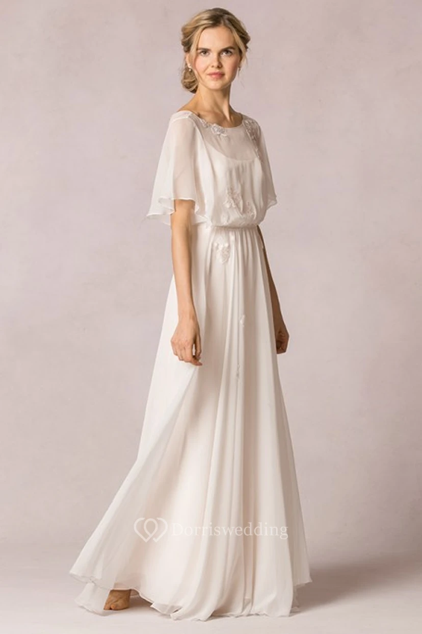 Robe de mariée bohème en mousseline de soie ornée d'appliqués et de plis, coupe fourreau, col rond, manches bouffantes et manches bouffantes. view 4