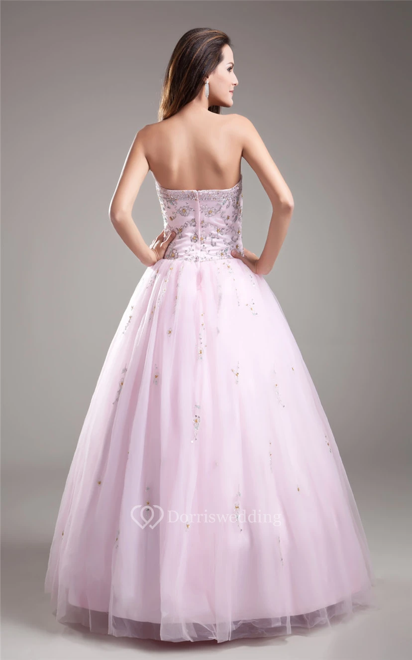 Blushing Strapless Beaded Ball Gown With Tulle Overlay view 8