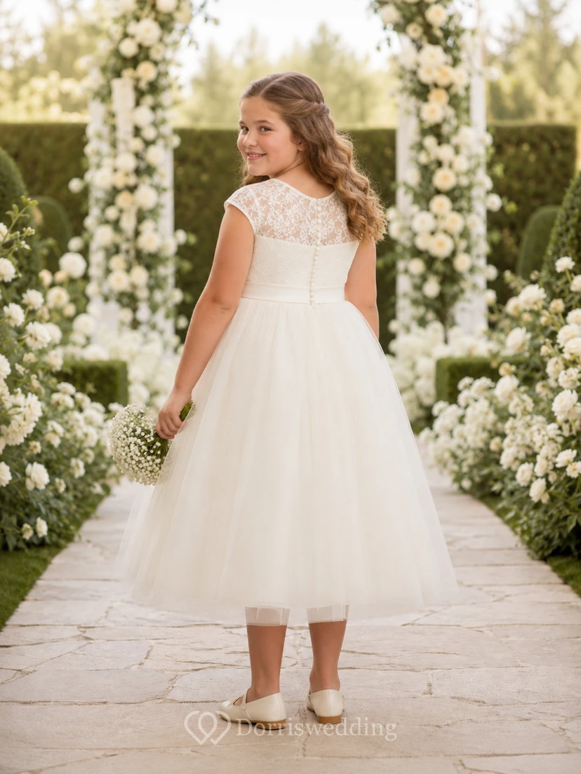 Vestido blanco de niña de las flores, clásico, largo hasta la rodilla, corte en A, mangas cortas con efecto ilusión, encaje, tul, satén, lazo, botones en la espalda. view 2