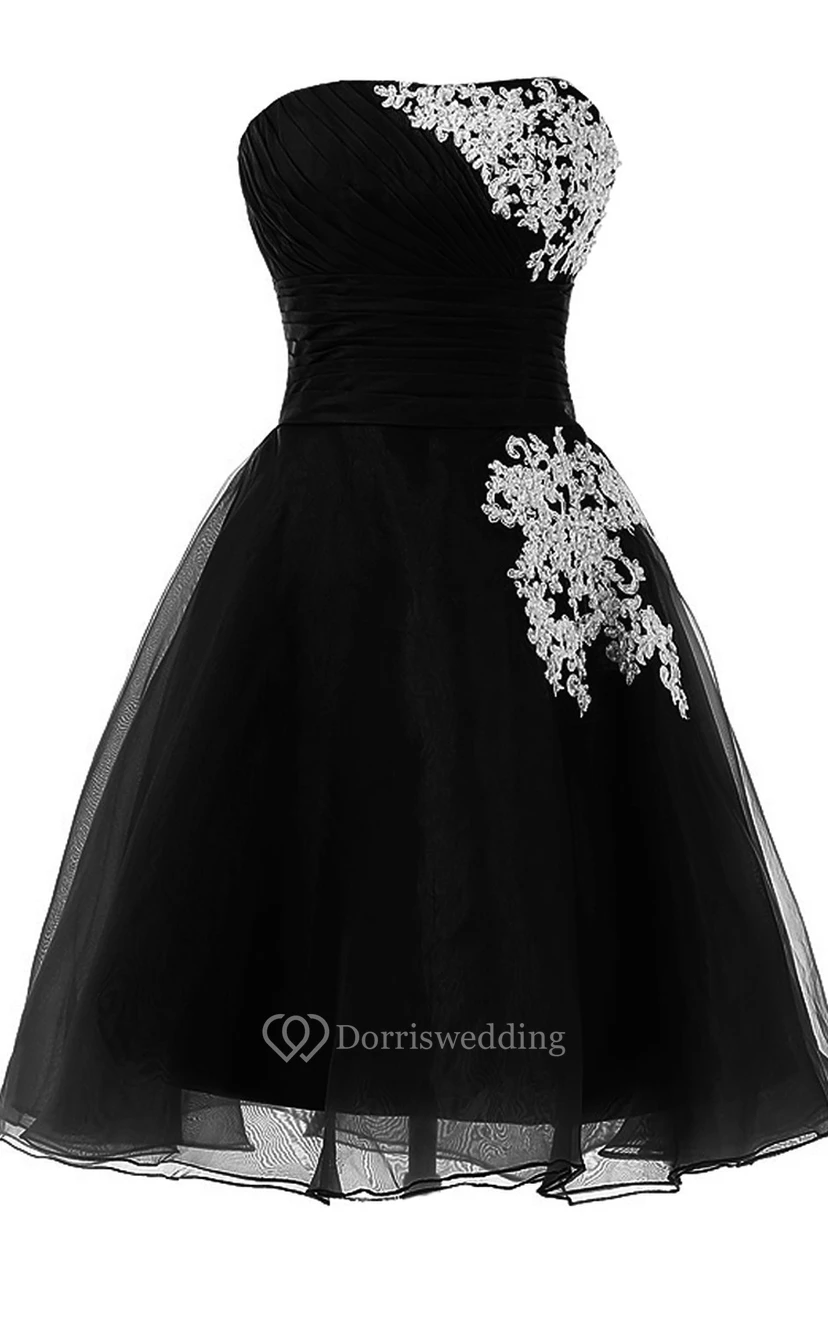 Robe de mariée bustier trapèze avec applications de dentelle