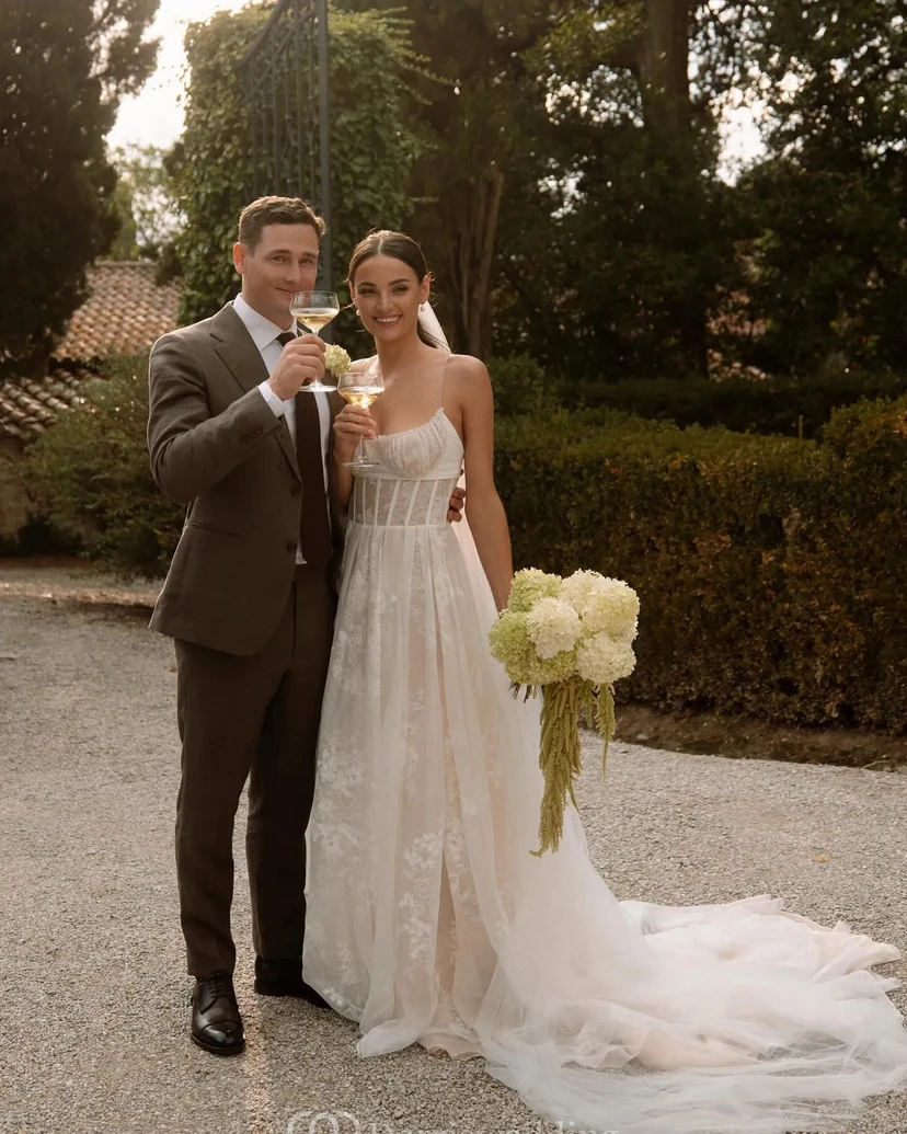 Modern Corset-Style A-Line Wedding Dress with Lace Overlay view 3