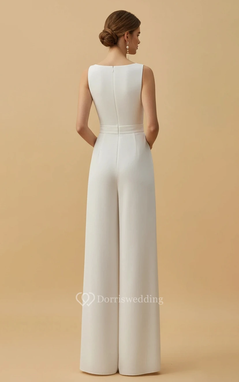 Mono de boda con escote en V, mangas cortas de tul, cintura decorada y pernera ancha. view 4