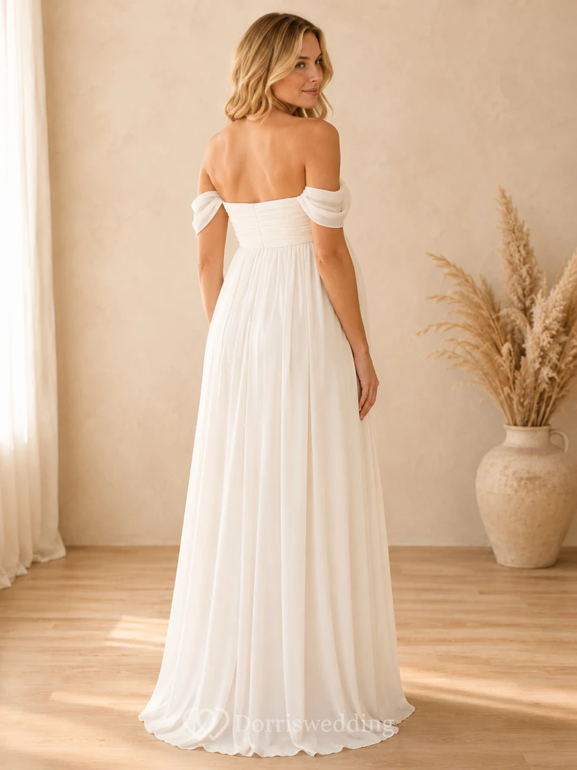 Klassisches, weißes Umstandskleid im Empire-Stil mit bodenlangem Schnitt, schulterfrei und kurzen Ärmeln aus Chiffon – romantisch und elegant – perfekt für Brautjungfern und Gäste im Garten. view 2