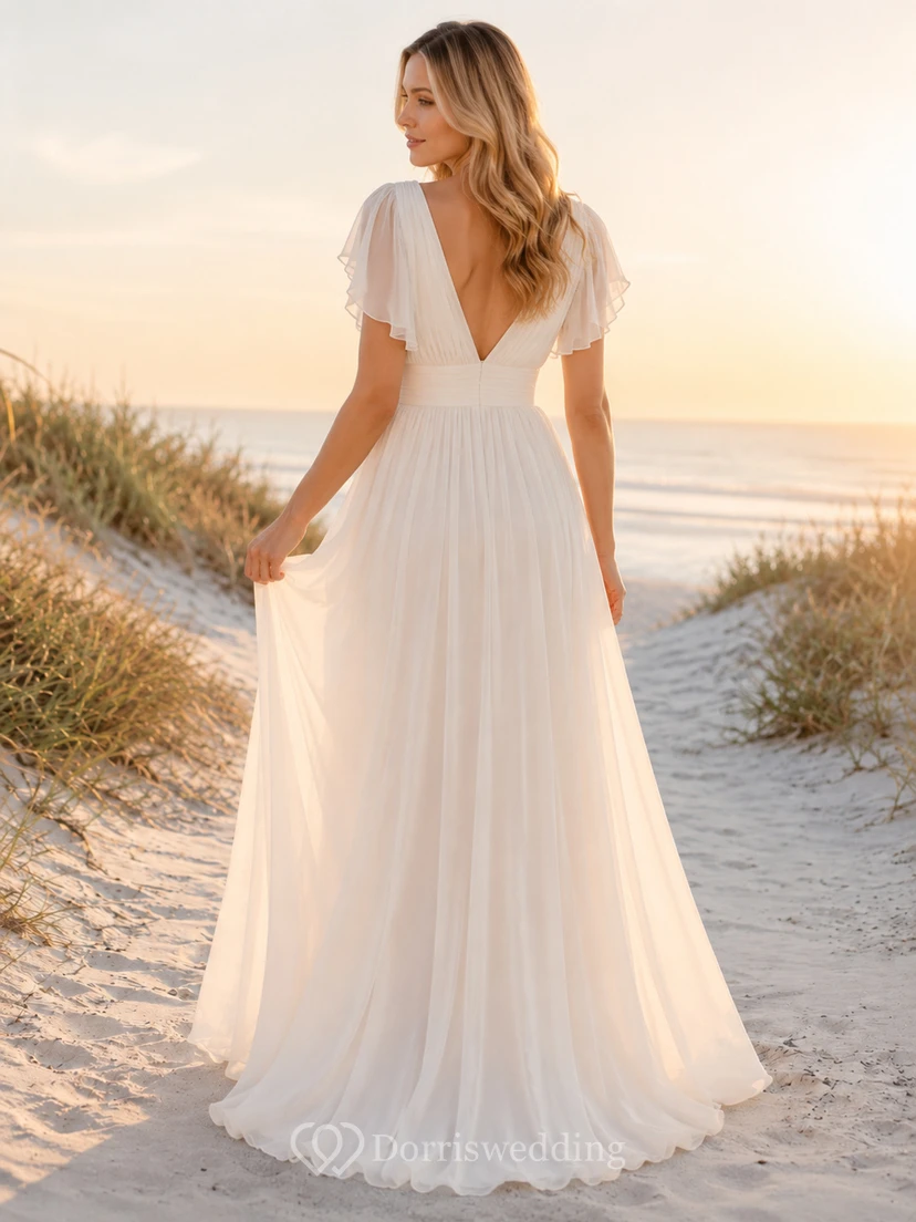 Robe de mariée bohème en mousseline, col en V, manches papillon, coupe empire, longueur au sol, idéale pour la plage view 2