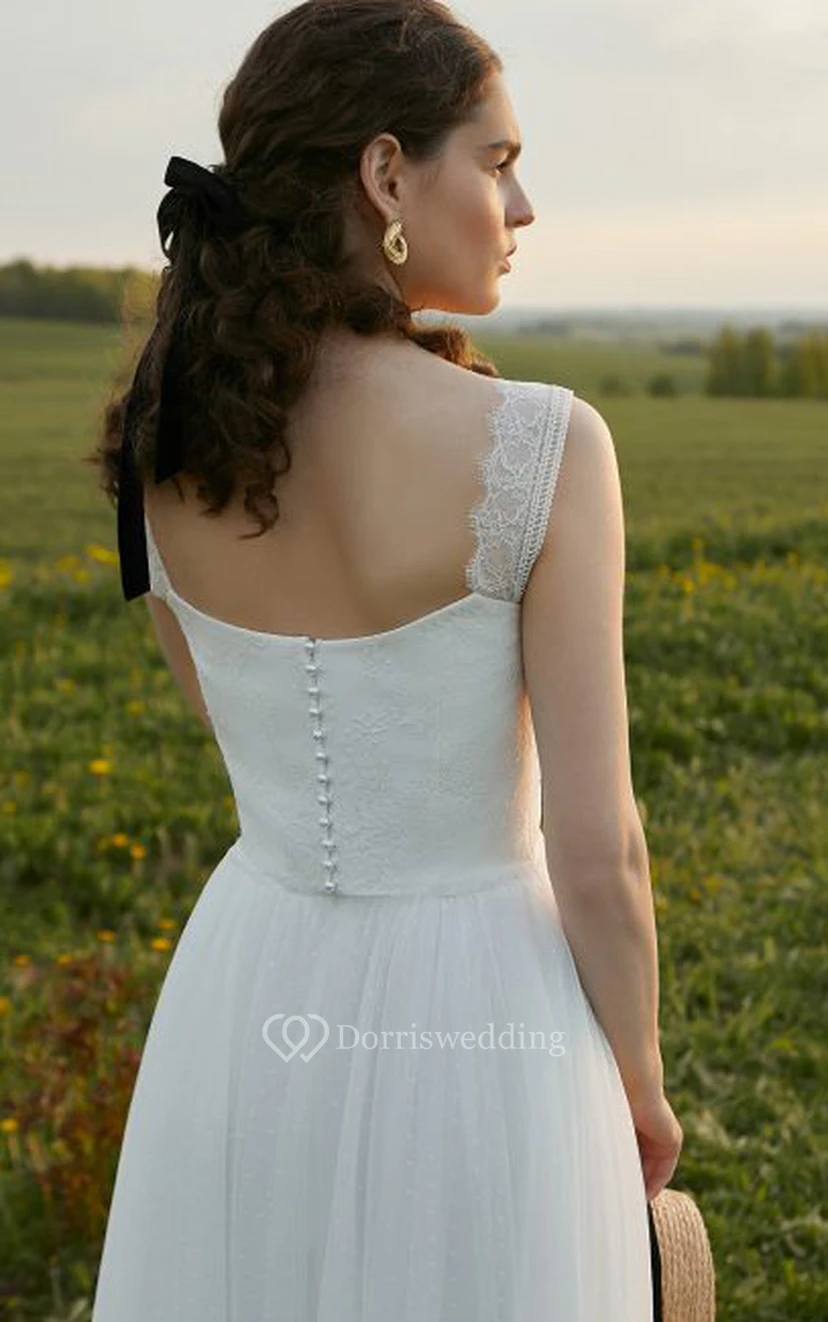 Robe de mariée vintage en tulle, longueur thé, sans manches, coupe trapèze, boutons et plis view 2