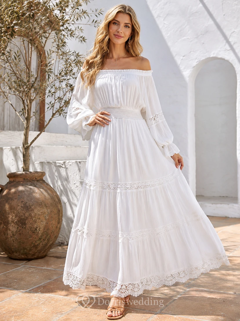 Robe de mariée bohème de plage en mousseline de soie à manches bouffantes et volants, épaules dénudées et dentelle, style poète