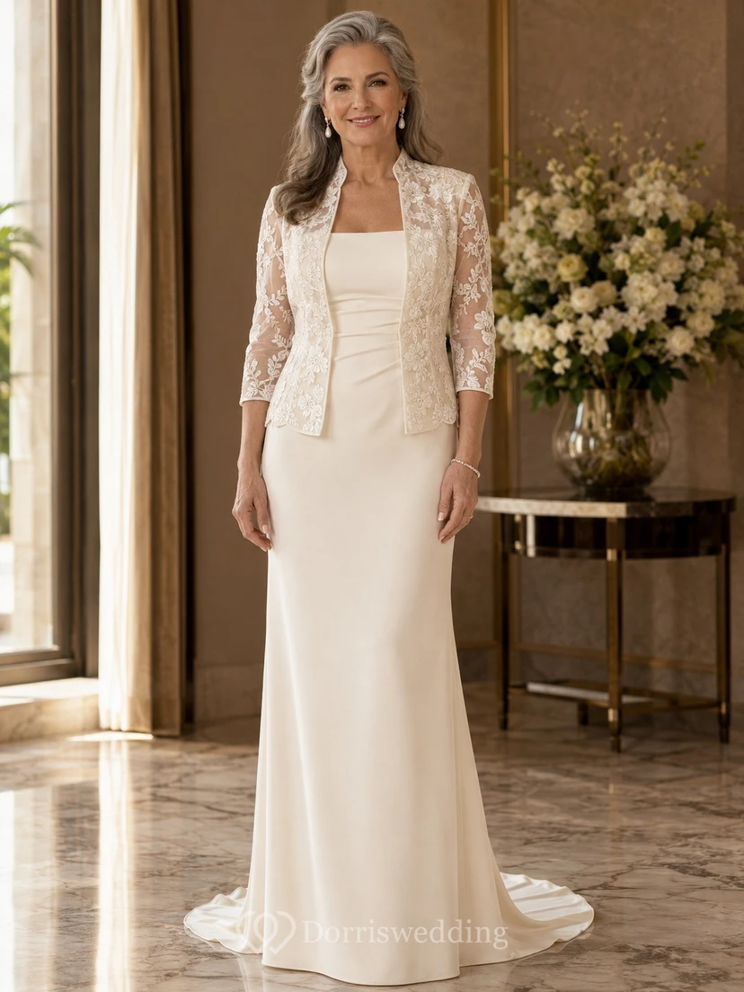Vestido de novia clásico de encaje con cola larga y mangas tres cuartos estilo sirena.
