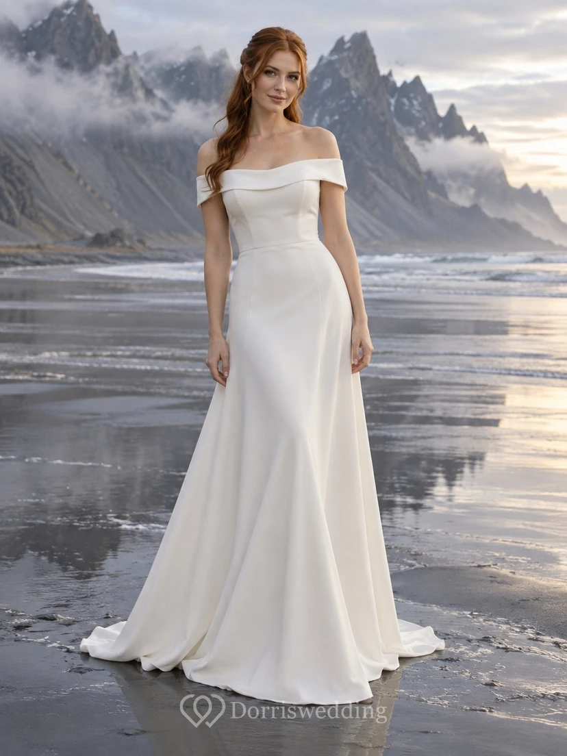 Sencillo vestido de novia de crepé con escote Bardot, corte en A, banda doblada y espalda abotonada.