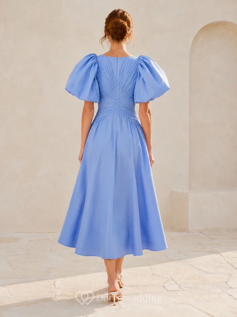 Blue puff sleeve pleated bodice tea length guest dress view 2