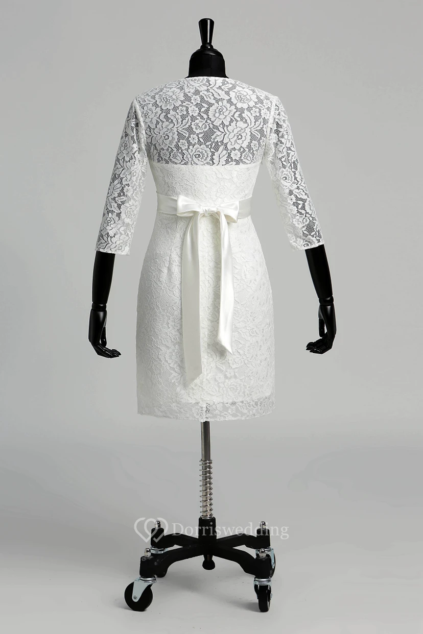 Robe de mariée en dentelle, coupe trapèze, col en V, manches illusion 3/4, longueur genou. view 10