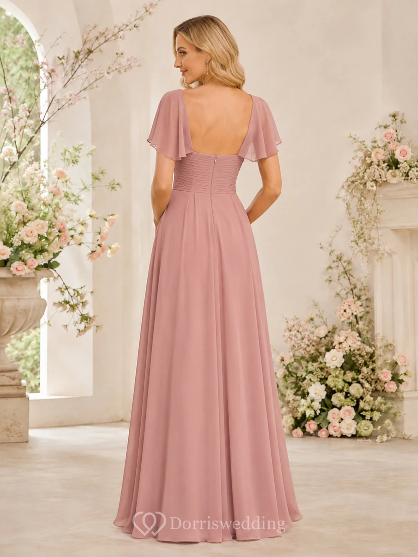 Robe de demoiselle d'honneur en mousseline rose poudré, col en V, manches cloche, coupe empire et longueur A, en mousseline, longueur au sol view 2