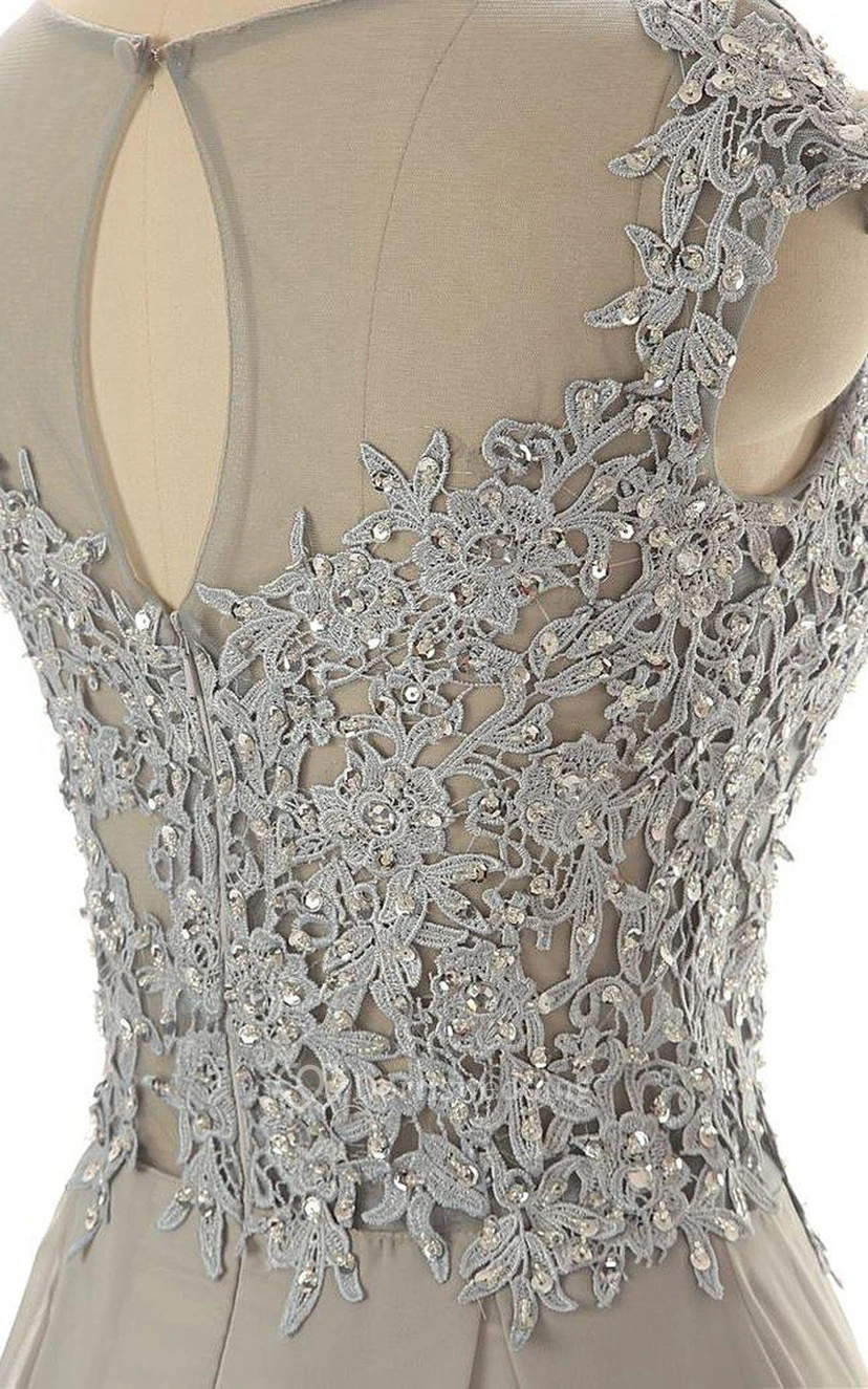 Vestido de corte A con mangas cortas y corpiño bordado con cuentas. view 13