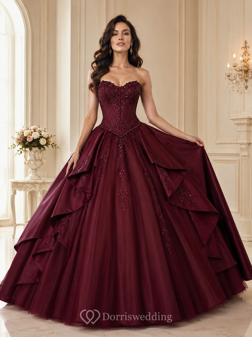 Vestido de princesa de lujo color borgoña sin tirantes con escote corazón y cintura tipo vasco, con capas y estilo princesa para quinceañera.