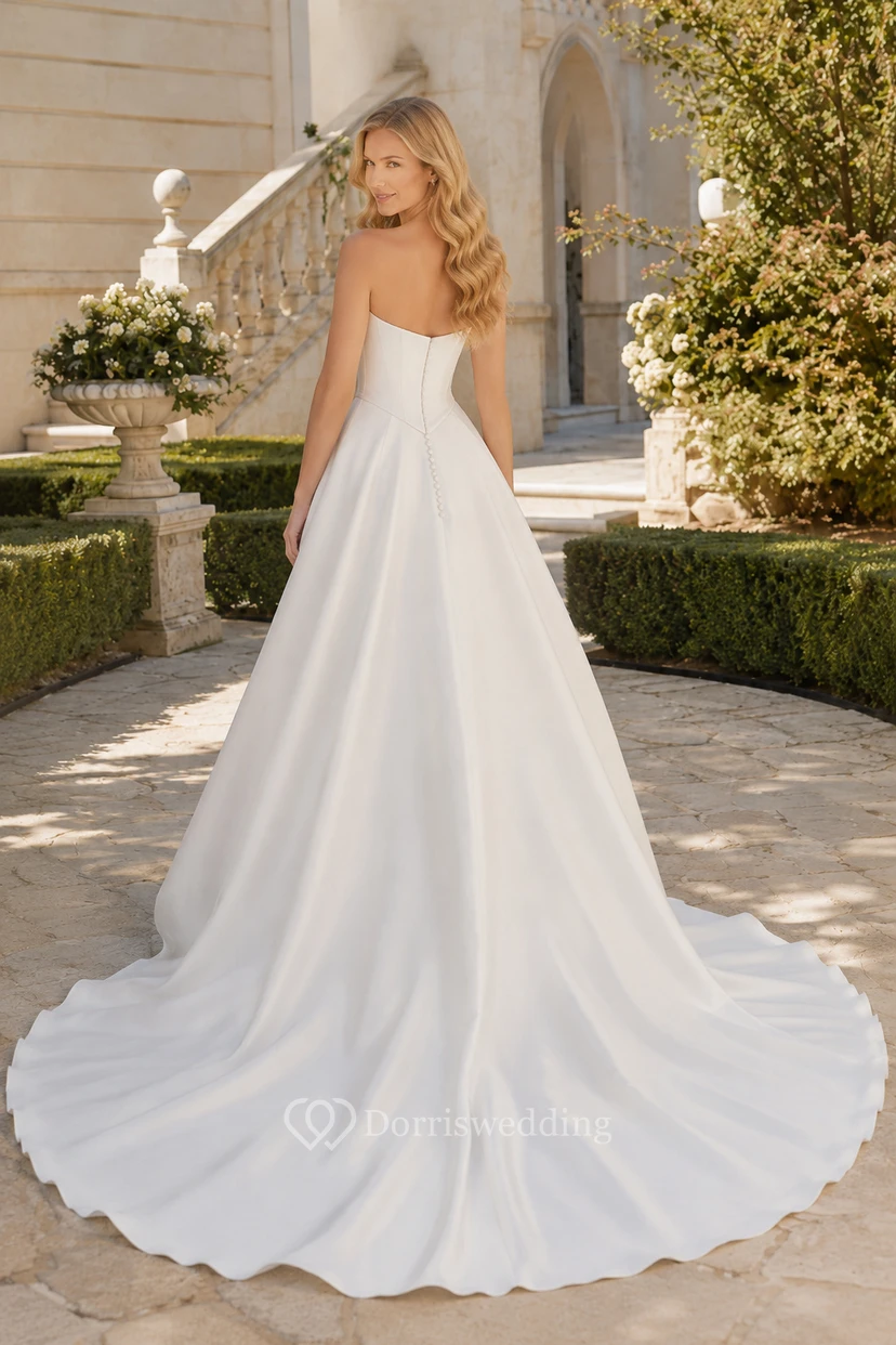 Vestido de novia palabra de honor de satén, corte en A, escote corazón y cola larga. view 2