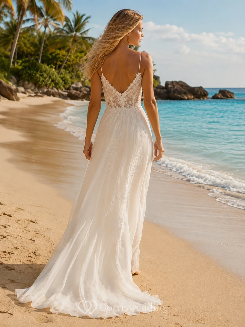 Robe de mariée trapèze en mousseline de soie à fines bretelles spaghetti et décolleté en V plongeant, idéale pour une escapade à la plage. view 2