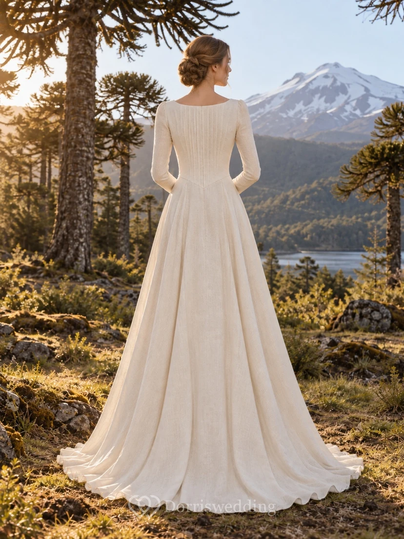Vestido de novia sencillo y modesto de manga larga en mezcla de lino con escote barco y cintura puntiaguda. view 2