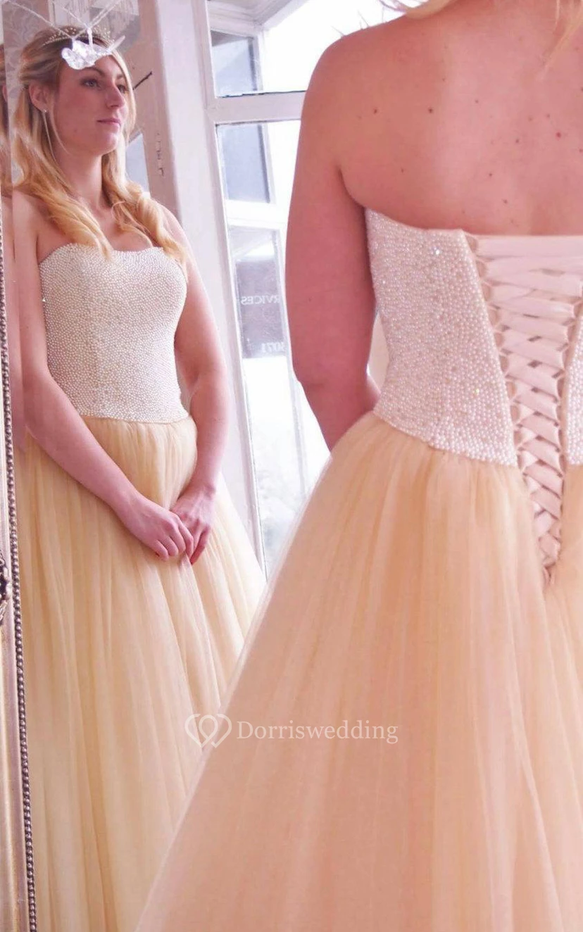 Tulle A-Line Strapless Gown With Lace-Up Back and Beaded Bodice view 4