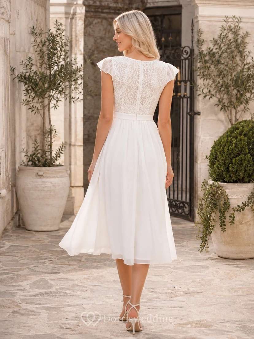 Vestido de novia de encaje de corte A, estilo civil modesto, con mangas cortas y largo hasta la rodilla. view 2