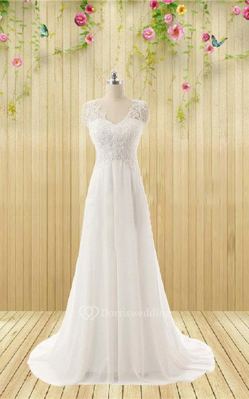 Robe de mariée sans manches à décolleté en V ornée de strass appliqués