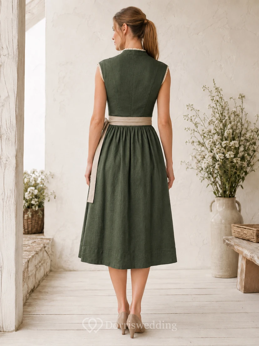 Dirndl moderno de lino verde oscuro, corte en A, largo hasta la rodilla, cuello alto, sin mangas, delantal view 2