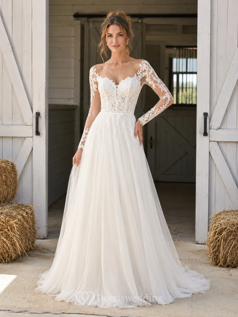 Robe de mariée champêtre romantique western à décolleté cœur, manches illusion longues, en dentelle et tulle, coupe trapèze, longueur au sol