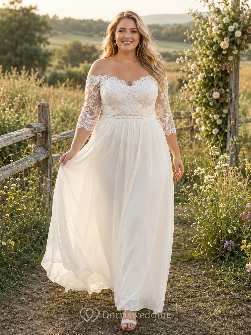 Robe de mariée en mousseline et dentelle, coupe trapèze, épaules dénudées, manches mi-longues, traîne.