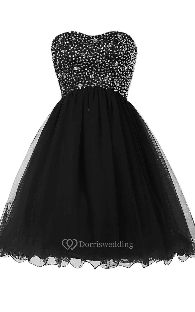 Robe courte bustier trapèze à corsage à sequins
