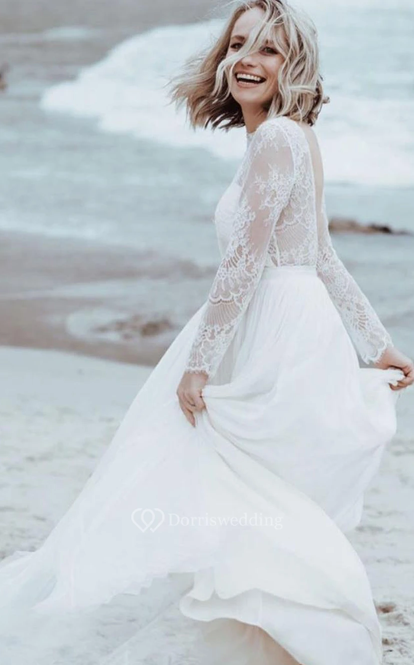 Robe de mariée simple en tulle et dentelle, coupe trapèze, longueur au sol, manches longues, fente sur le devant et plis view 3