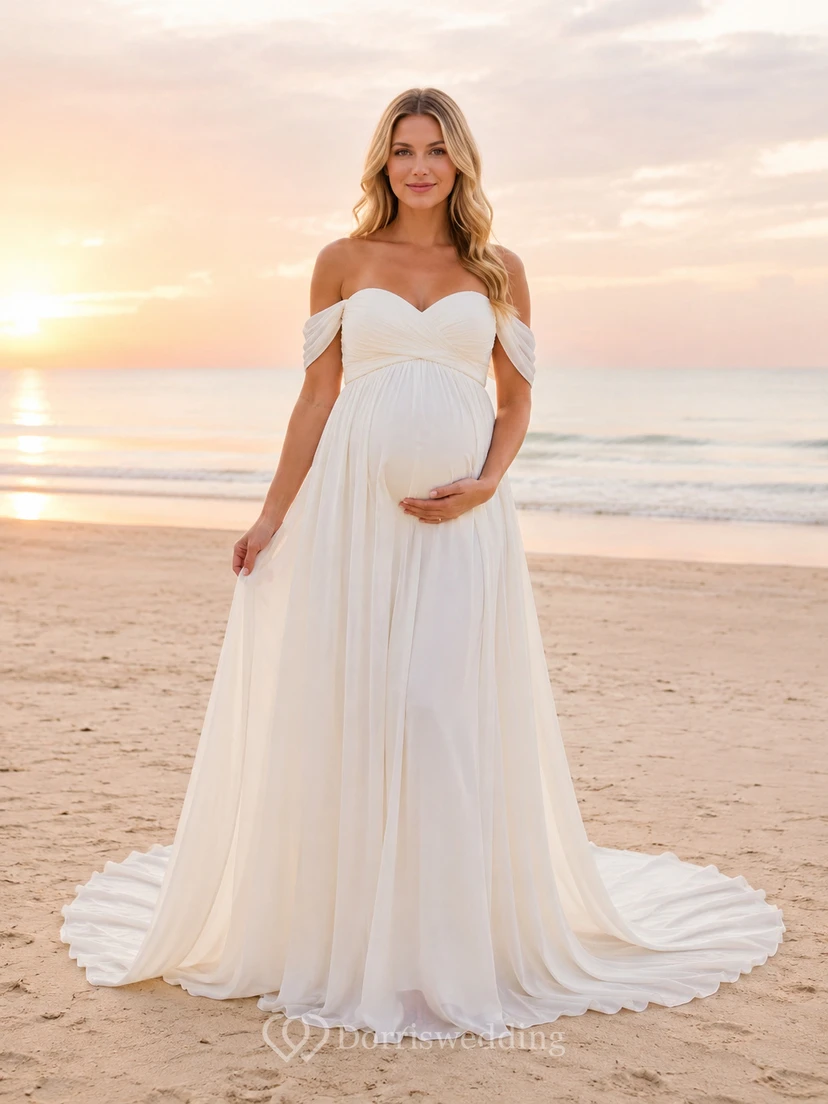 Robe de mariée en tulle style empire, épaules dénudées, longueur au sol, idéale pour la plage.