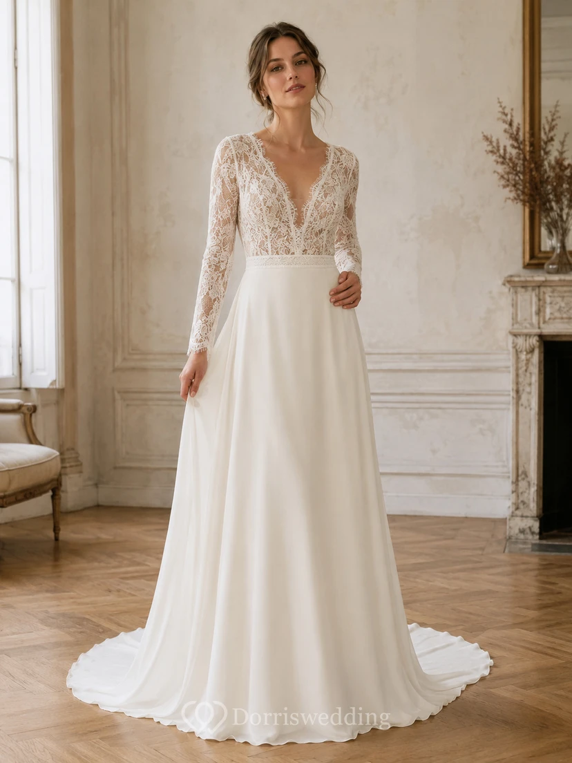 Robe de mariée raffinée en mousseline de soie et dentelle, décolleté en V profond, manches longues, coupe trapèze, traîne, dos nu plongeant, manches longues et bustier en V.