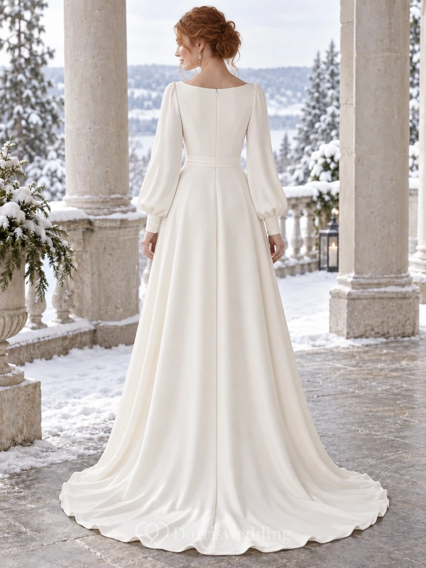 Vestido de novia de crepé con escote barco y cola larga, mangas obispo y corte en A view 2