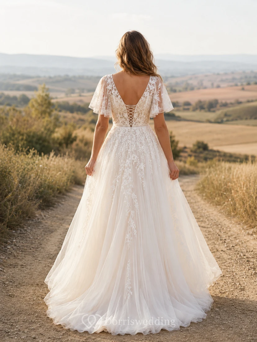 Vestido de novia de tul y encaje campestre, corte en A, hombros descubiertos, manga corta, cola de capilla, espalda baja en V. view 2