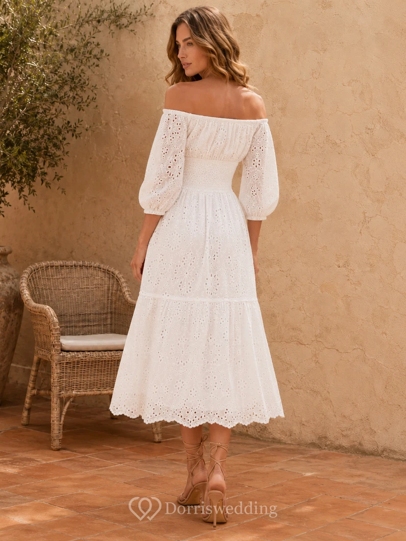 Robe de mariée mi-longue à volants, épaules dénudées et manches bouffantes en dentelle view 2