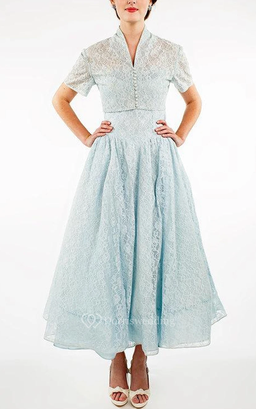Robe en dentelle à bretelles avec veste et boléro