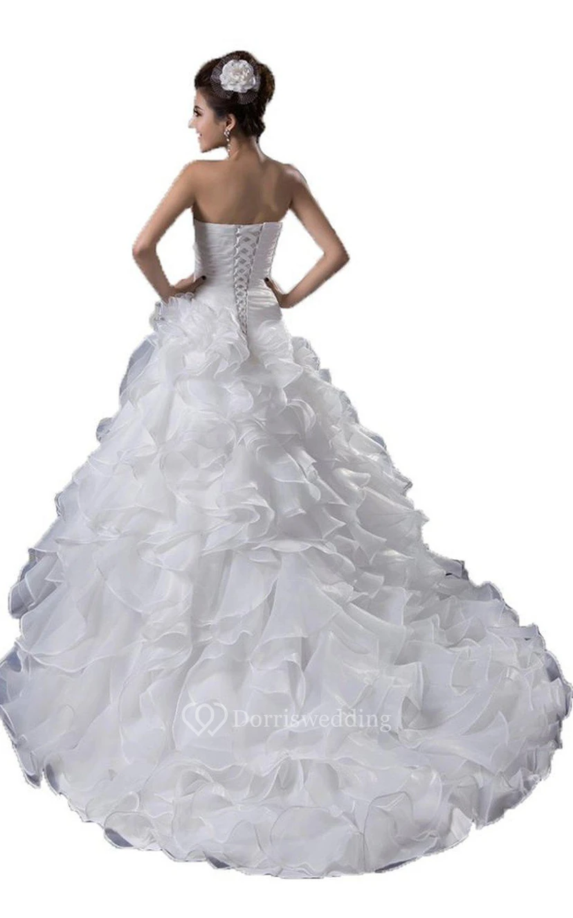 Vestido de gala con escote corazón, volantes y espalda con cordones. view 2