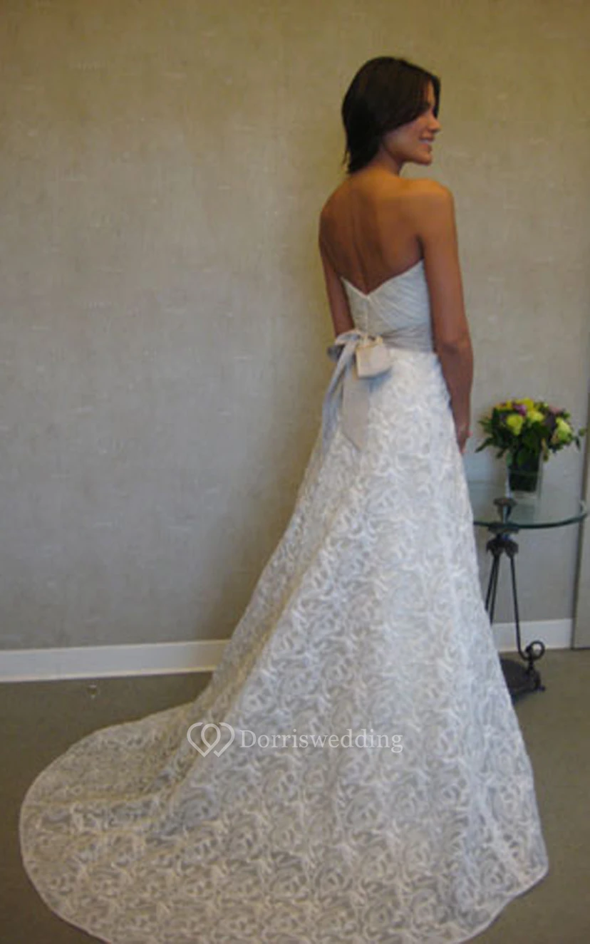 Alluring Crisscross Ruched Bodice Organza Gown With Floral Embellished Waist view 5