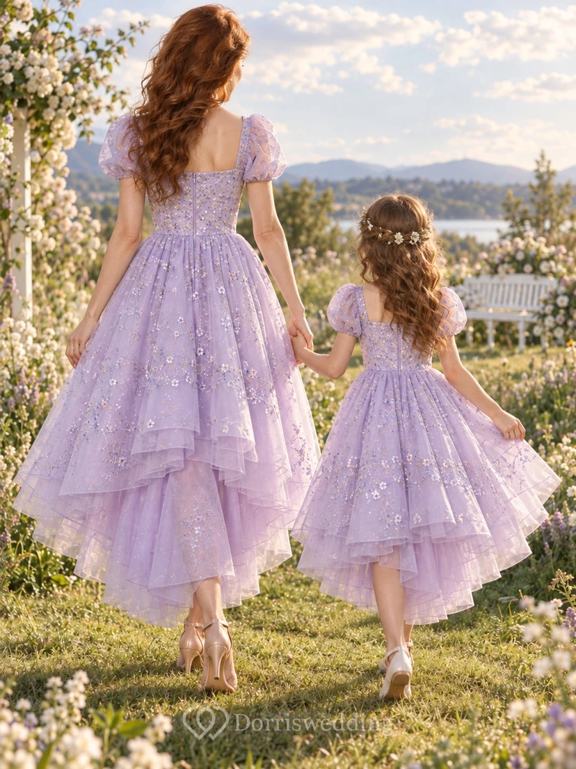 Vestido de fiesta a juego para madre e hija, color lavanda, con mangas abullonadas y corte asimétrico. view 2