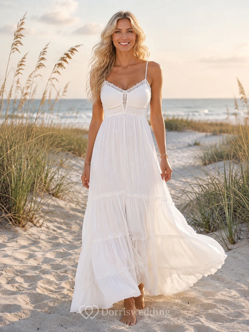 Vestido de novia bohemio romántico de gasa, largo hasta el suelo, con escote en V, corte en A y tirantes finos.