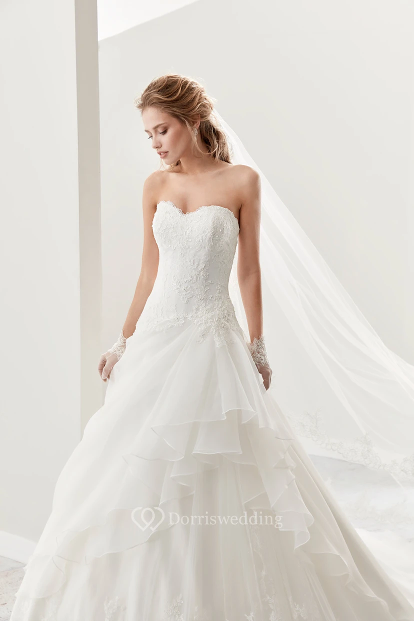 Sweetheart A-Line Lace Bridal Gown With Asymmetrical Ruffles Overlayer And Lace-Up Back view 3