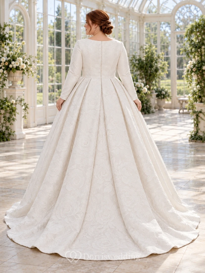 Vestido de novia discreto de manga larga con escote barco, estampado floral jacquard y falda plisada en línea A. view 2