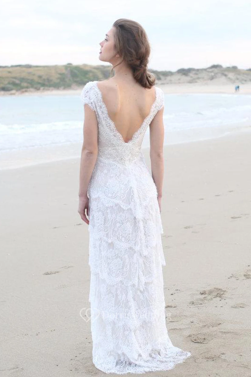Robe de mariée bohème à décolleté plongeant et manches courtes, dos nu en V profond view 4