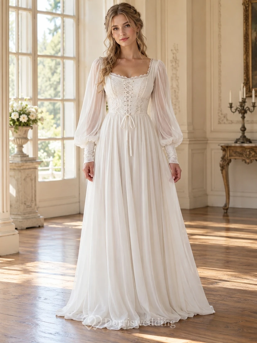 Robe de mariée Renaissance en mousseline à manches longues, col rond et corset trapèze