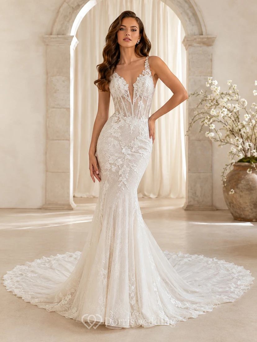 Robe de mariée sirène sans manches en dentelle, décolleté en V profond, traîne cathédrale et applications florales, coupe sculpturale. Idéale pour la réception.
