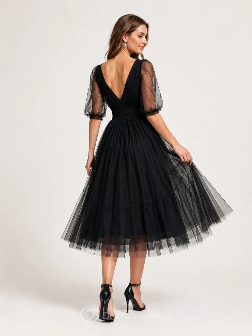 Vestido de noche negro de tul con escote en V, manga larga, corte en A y largo hasta la rodilla view 2