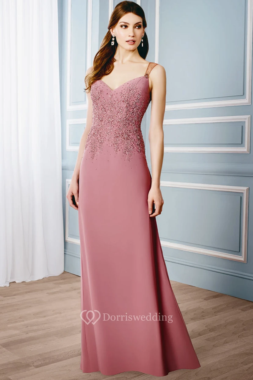 Robe de soirée sans manches en jersey à col V et dos illusion, ornée d'appliqués et d'appliqués.
