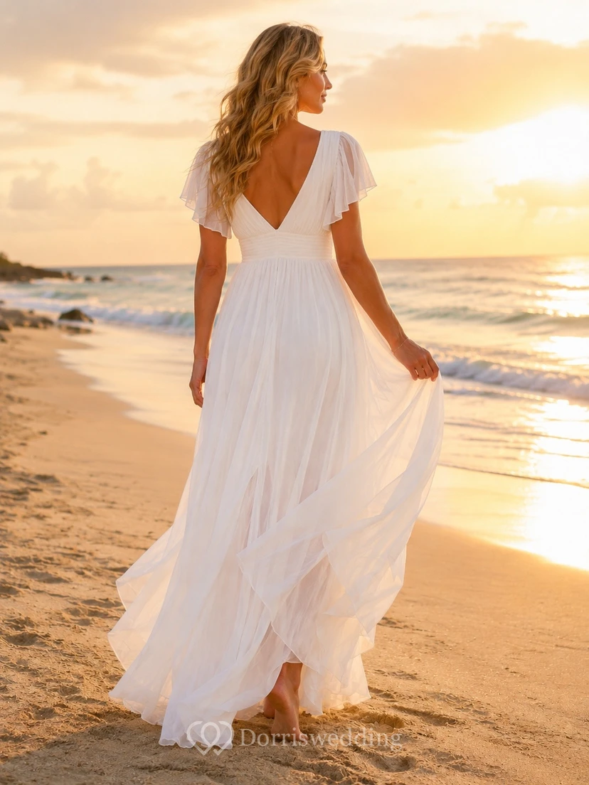 Vestido de novia blanco de corte A con escote en V y mangas con volantes, ideal para la playa. view 2