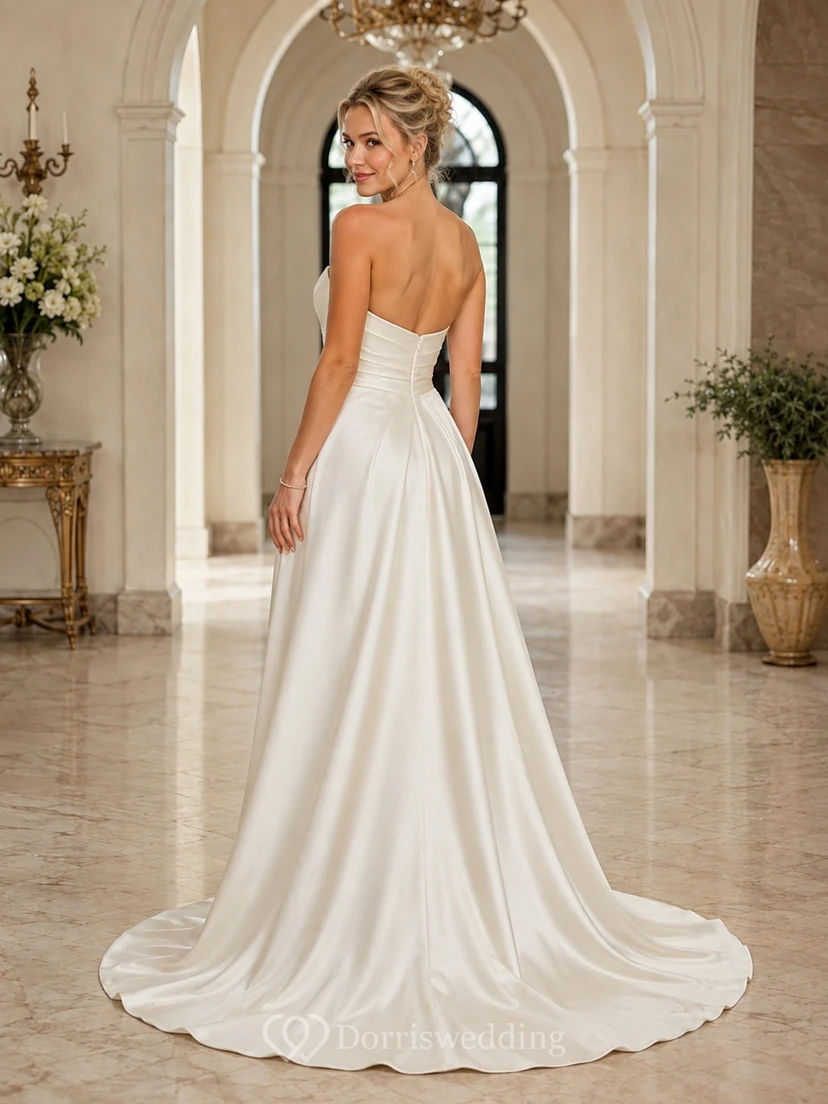Ärmelloses, drapiertes Brautkleid aus Satin mit herzförmigem Ausschnitt und A-Linien-Schnitt, bodenlang. view 2